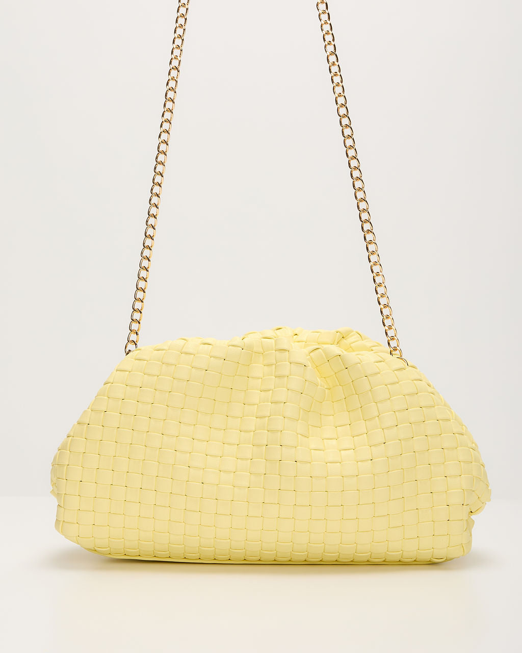 Janice Woven Leather Pouch Clutch